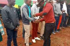 mr-kiguta-in-a-hat-awarding-2021-KCSE-candidates-on-1st-july-2022